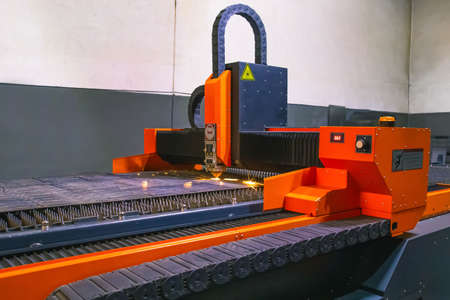 The laser machine is engaged in metal cutting at the factory