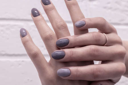Women's hands after a manicure in a beauty salonの写真素材
