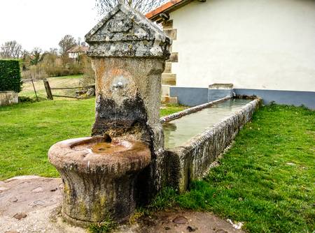 An old fountain in a villageの写真素材