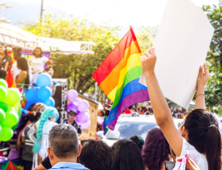 lgbt people in march 2022 protesting in happy festival with flags balloons and banners happyのeditorial素材