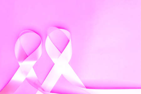 Breast cancer awareness ribbon, pink ribbon, white ribbon, fight against violence against women, international cancer day concept.の写真素材