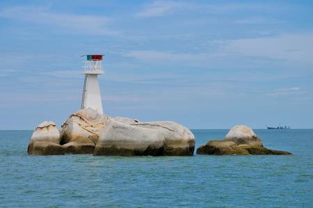 Pangkor Island, Malaysia, March 13, 2011: Passing a Lighthouse at Pangkor Island towards Lumut Jettyのeditorial素材