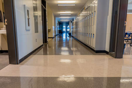 Swift Current, SK- September 2, 2019: Interior of a bright, empty school hallway: back to school...