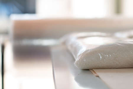 Sugar. Sugar packets. Grain store. Stacking of sugar bags. Agricultural sector. High quality photoの写真素材