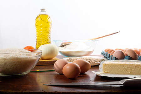 Eggs in the foreground. Ingredients to make lunch.の写真素材