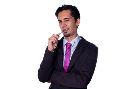 Elegant man wearing his glasses for flirting, isolated on white background.の写真素材