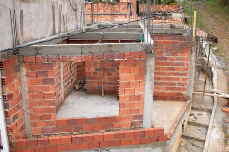 House under construction with its columns and walls recently built.の写真素材