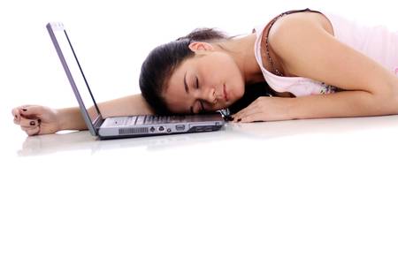 Girl working on a laptopの写真素材