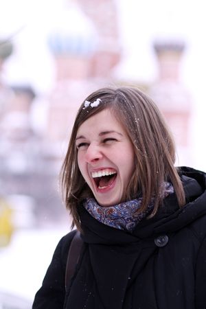 Laughing beautiful girl snowboarderの写真素材
