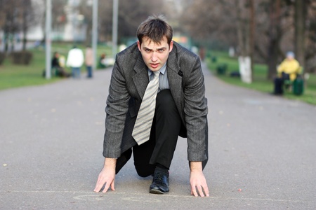 Portrait of a handsome man walking outdoorの写真素材