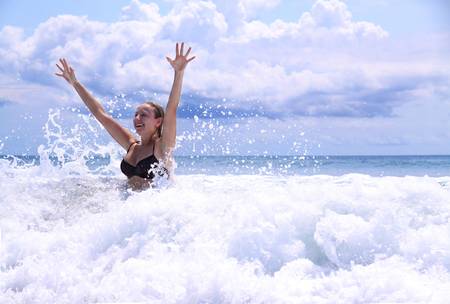 On a wave crestの写真素材