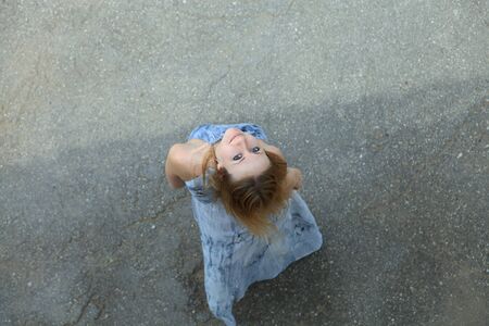 young woman in a blue dressの写真素材