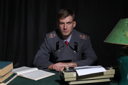 Russian military officer in a dark cabinetの写真素材