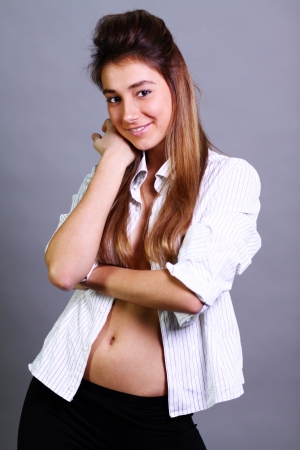 Portrait of beautiful woman in white shirtの写真素材