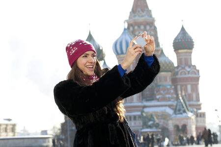 Young woman photographed attractions in Moscow