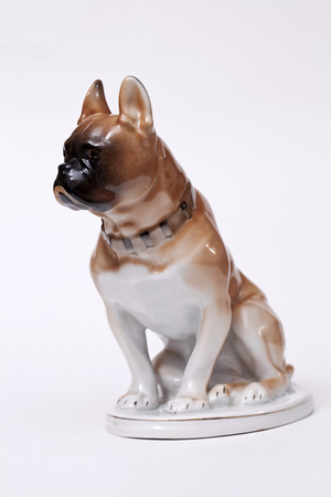 Pug  Dog ceramic figurine, isolated on white の写真素材