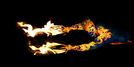 Body art glowing in ultraviolet light