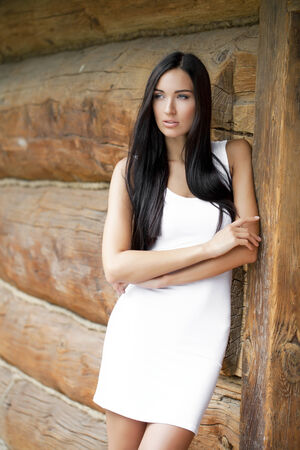 Sexy young woman in white dressの写真素材