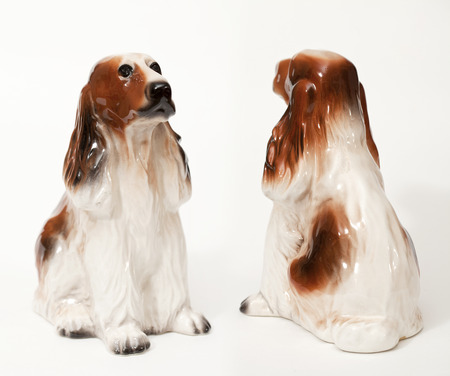 Cocker Spaniel. Ceramic figurine, dog breed isolated on whiteの写真素材
