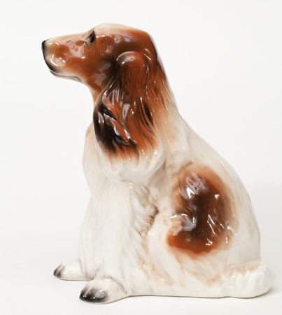 Cocker Spaniel. Ceramic figurine, dog breed isolated on whiteの写真素材