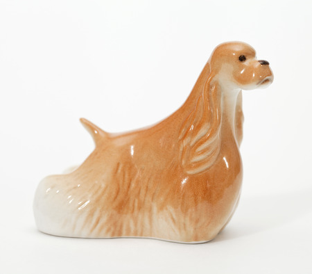 Cocker Spaniel. Ceramic figurine, dog breed isolated on whiteの写真素材