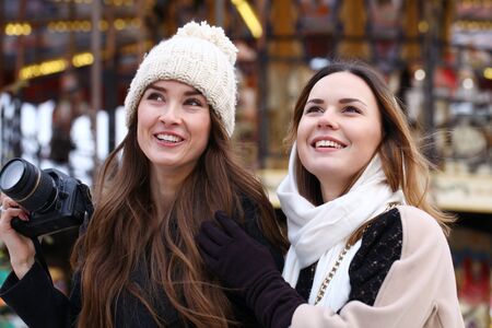 Two girls tourists are photographed in Moscow (Russia) winter 2015の写真素材