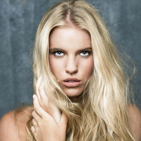 Portrait of pretty young blonde womanの写真素材