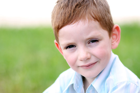 Closeup portrait of beautiful little boyの写真素材