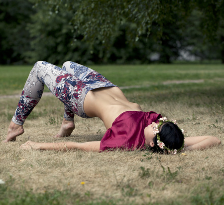 Portrait in full growth, young beautiful model in stylish leggingsの写真素材