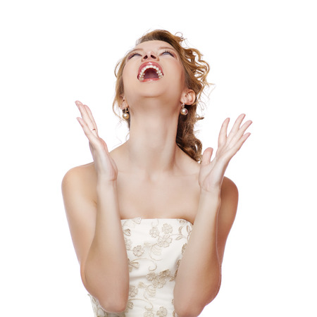 Close up portrait of a beautiful young red hair woman, isolated on white backgroundの写真素材