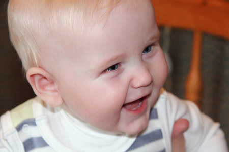Closeup six month old baby blonde boyの写真素材