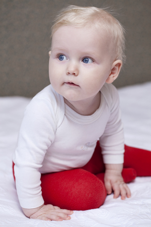 Ten months old baby blonde boyの写真素材