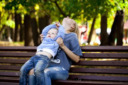Happy Little boy play in summer parkの写真素材
