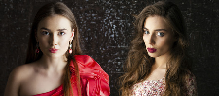 Collage two women. Portrait of Young brunette girls on dark studio wall background