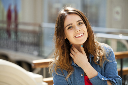 Portrait close up of young beautiful brunette woman, indoorの写真素材