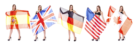 Collage of young sexy woman holding various flags of the world, isolated on white backgroundの写真素材
