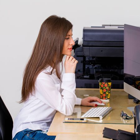 Young business woman in the office