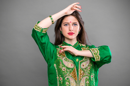 Close up portrait of beautiful eastern woman in green sariの写真素材
