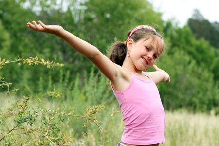 Beautiful little girl at the parkの写真素材
