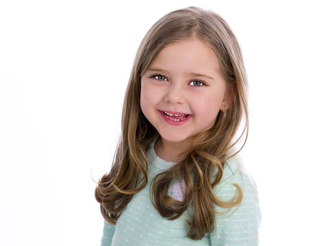 Beautiful blonde little girl, isolated on white backgroundの写真素材