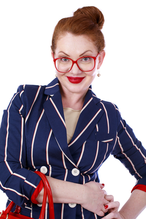 Stylish middle-aged lady isolated on white backgroundの写真素材