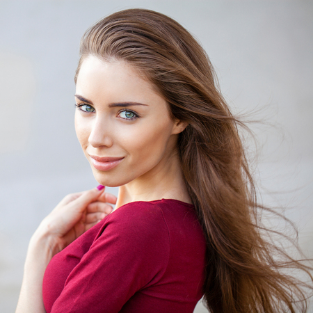 Close up, portrait of a young beautiful brunette womanの写真素材