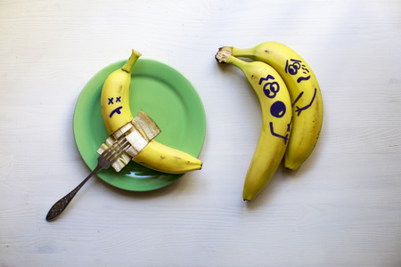 Banana humor, how to eat bananas on the table correctlyの写真素材