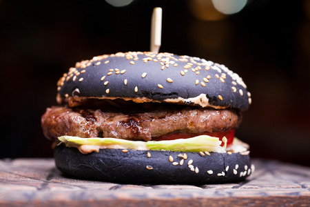 Gourmet black burger with Spicy sauceの写真素材