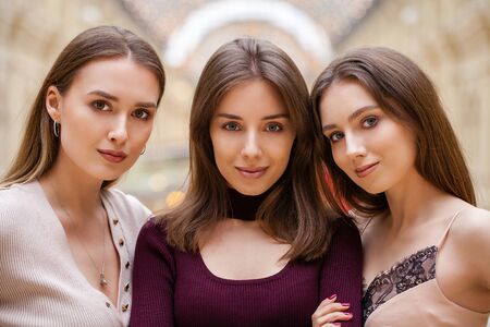 Make up  beauty. Three brunette young women, indoorの写真素材
