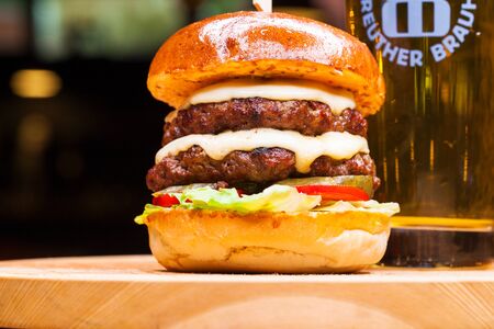 Restaurant dish - beef hamburger, dark ondoor