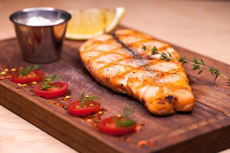 Restaurant dishes fried salmon steak