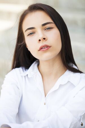 Young Beautiful brunette woman, summer park outdoors