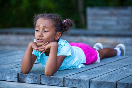Portrait of a beautiful brunette little girlの写真素材