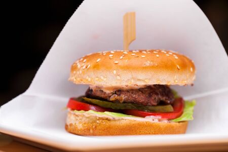 Restaurant dish - beef hamburger, dark ondoorの写真素材
